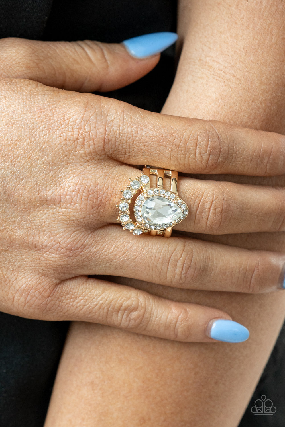Elegantly Cosmopolitan - Gold Paparazzi Ring