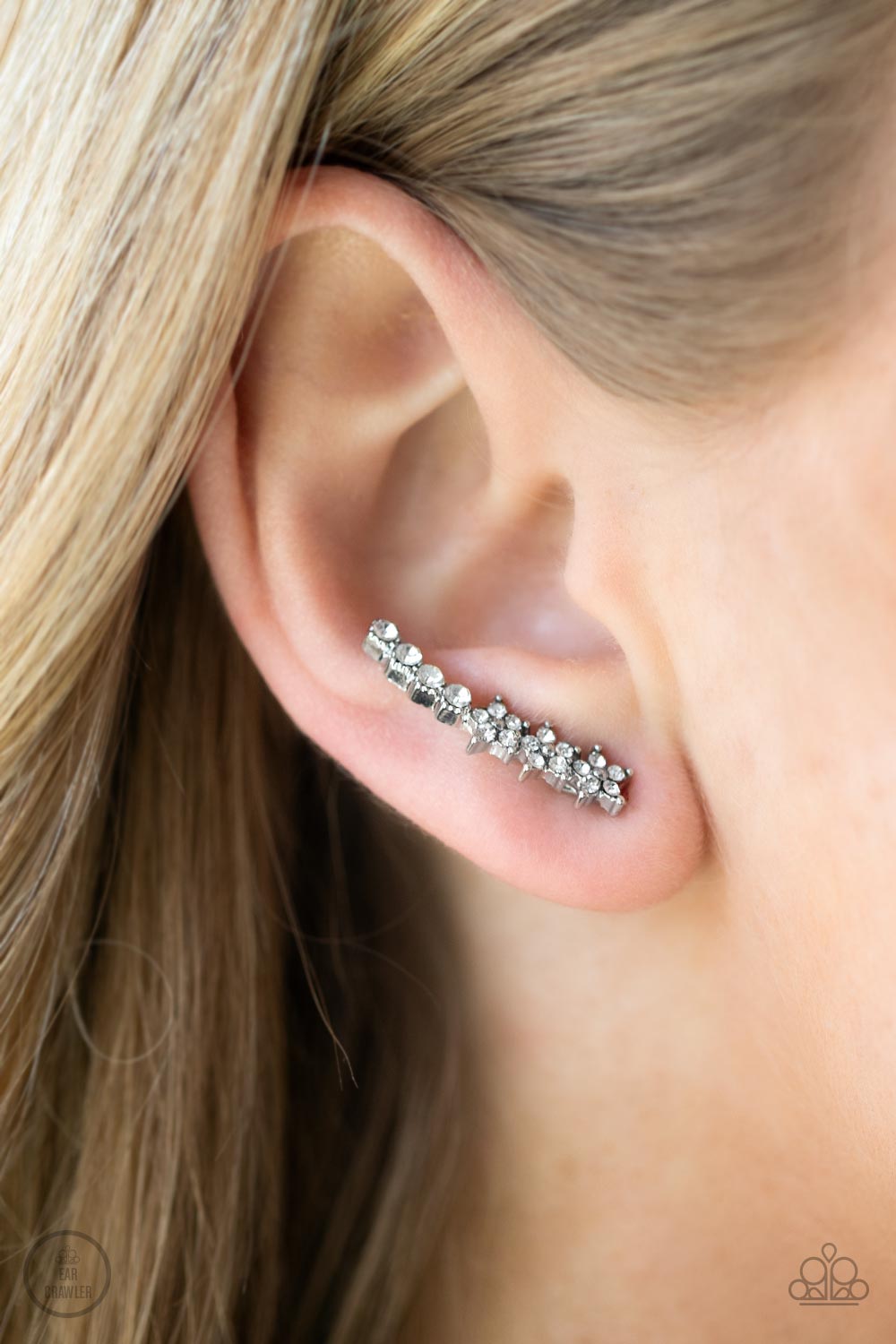 Flowery Finale - White Paparazzi Ear-Crawler Earrings