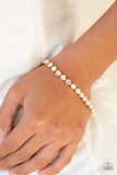 Out Like A SOCIALITE - Gold Paparazzi Bracelet