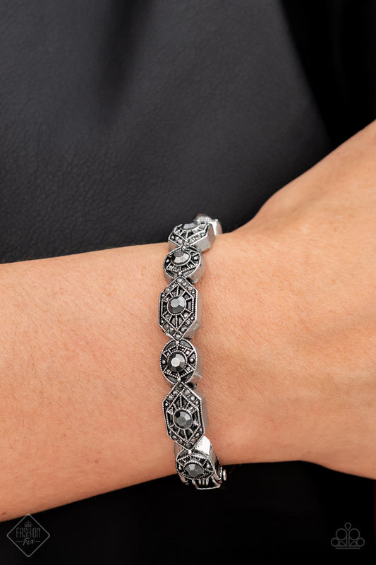 Eye-Opening Opulence Silver Paparazzi Fashion Fix Bracelet
