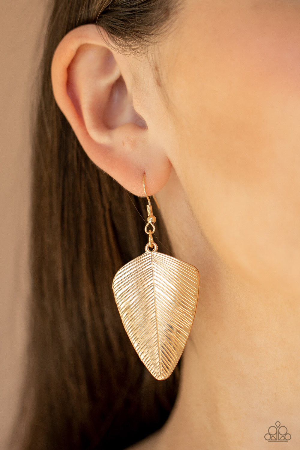 One of the Flock Gold Paparazzi Earrings